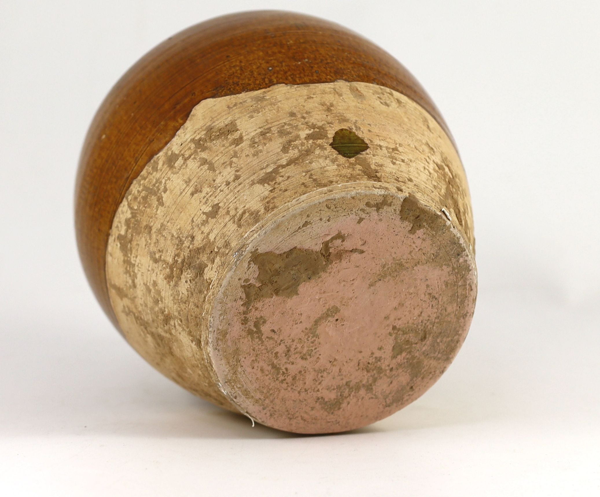 A Chinese straw glazed ovoid jar, Tang dynasty 19.5cm high